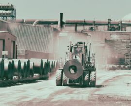 A Taylor forklift working hard a steel mill.